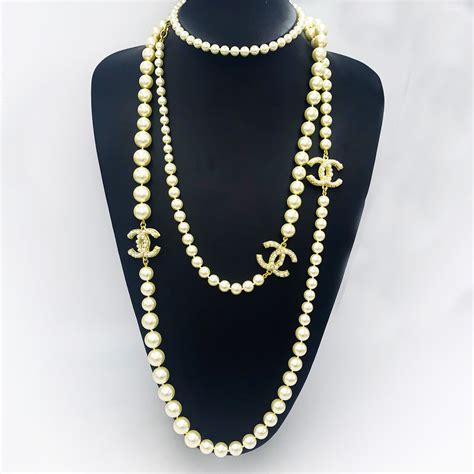 chanel necklace with pearl drop price|Chanel long necklace with pearls.